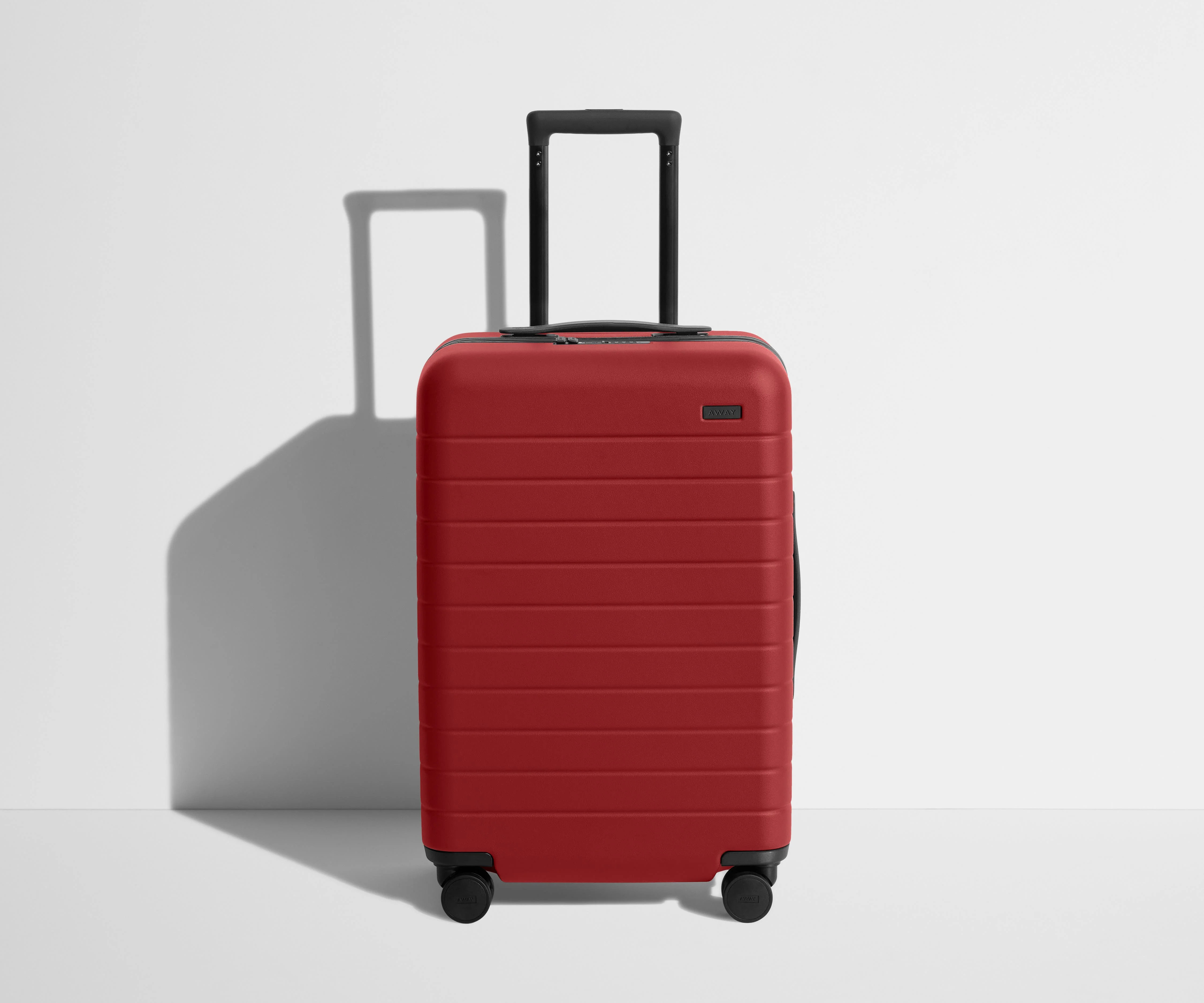 Shop The Bigger Carry-On suitcase in Tango Red | Away | Away
