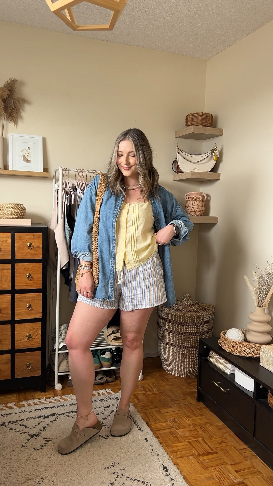 Easy summer outfit! Canadian links are under “similar products”. Wearing my usual size L in the striped shorts, butter yellow tank top, and oversized denim shirt. Straw tote bag is one of my fave Amazon finds! Linked similar clogs

#LTKsummer #LTKsale #LTKmidsize