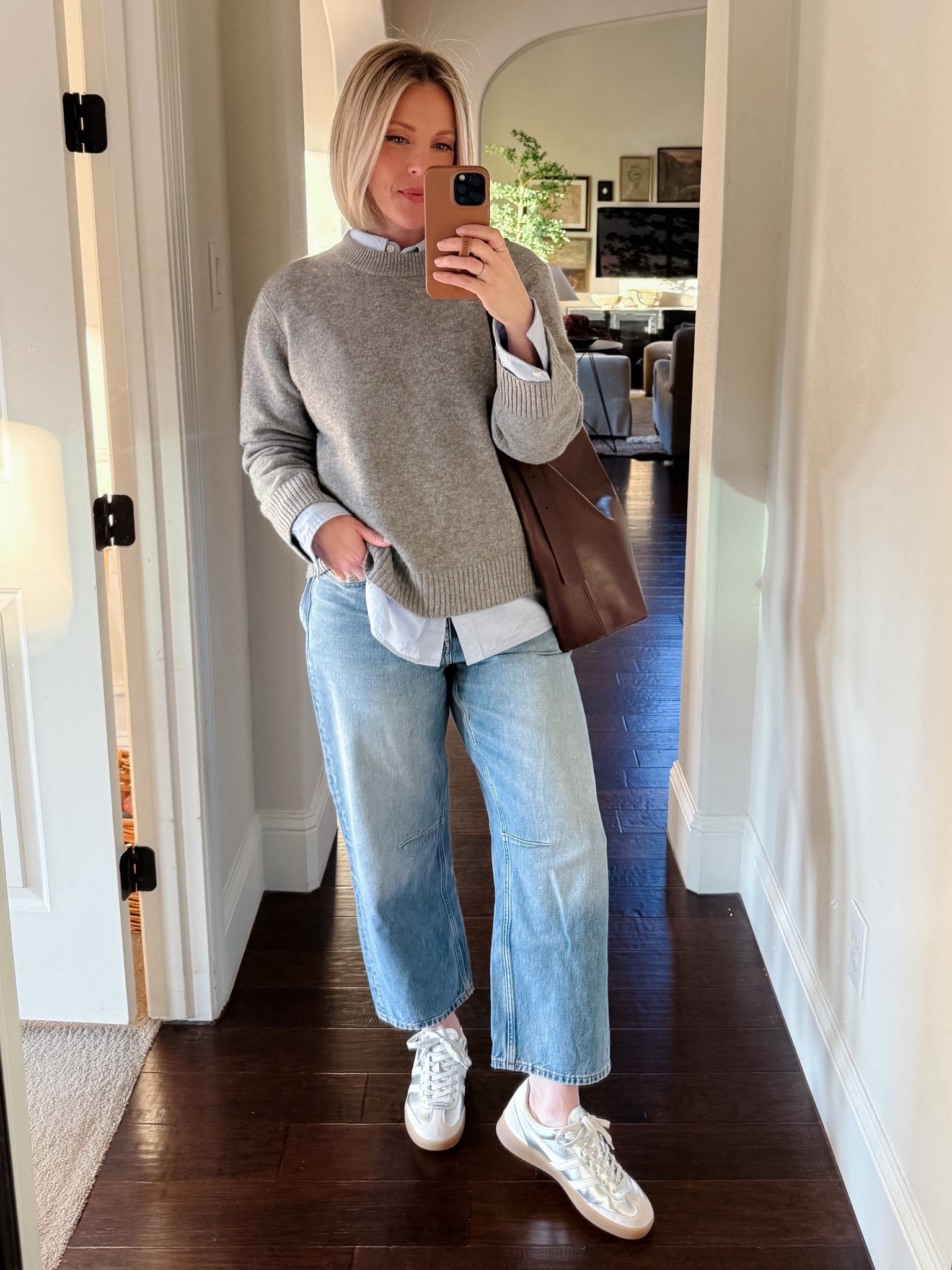 This viral cashmere sweater has lived up to expectations. It’s my most worn sweater this year.

Size down in the Gola Vipers. I’m normally a women’s 9 and wear the 8.

Grey cashmere crewneck sweater jumper, light wash barrel leg denim, silver Gola sneakers, blue button up, burgundy tote, casual women’s jeans and sweater outfit

#LTKMidsize #LTKOver40 #LTKootd