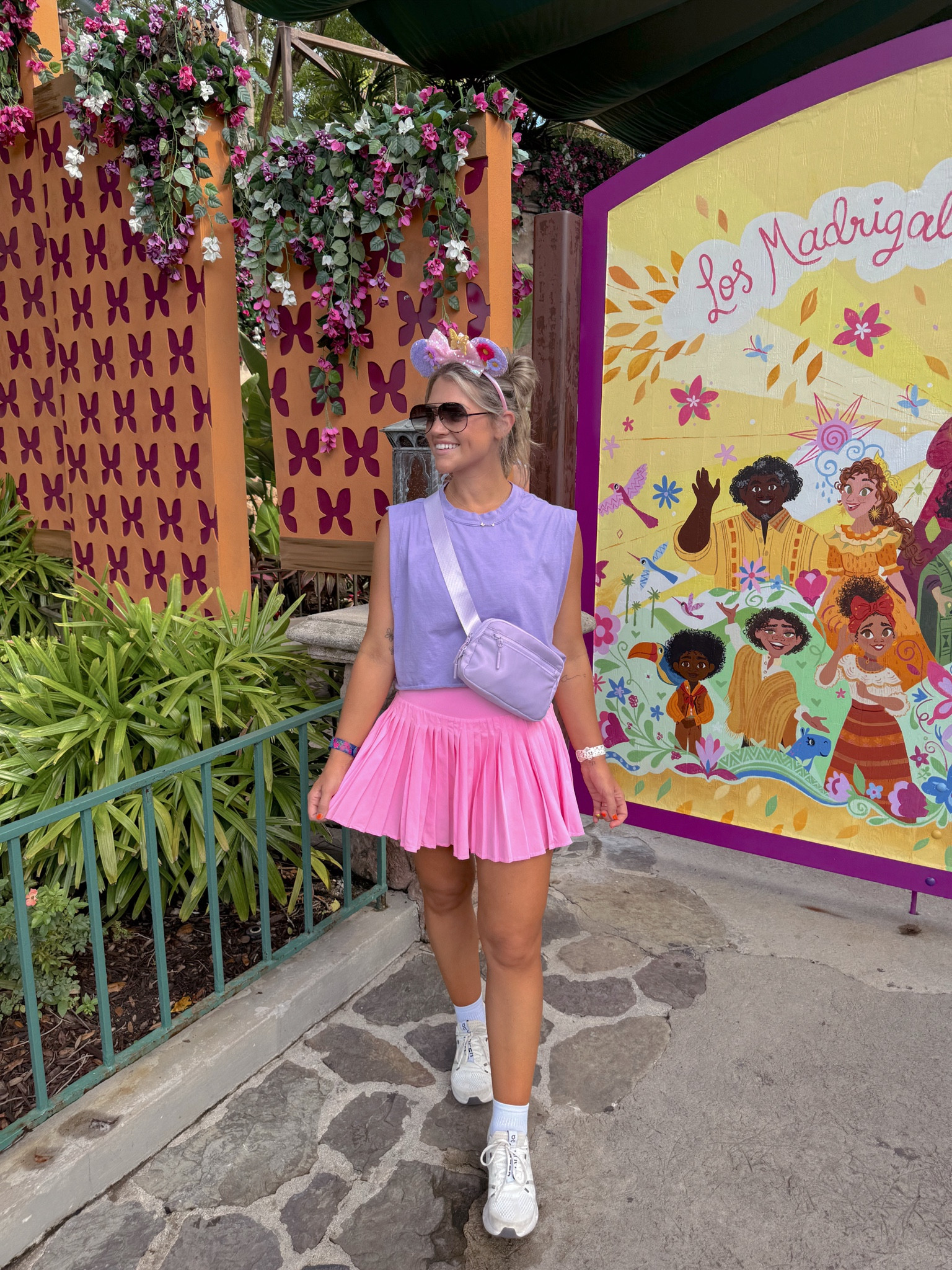 Disney outfit today 💜🌸 size small tank - runs oversized but I LOVE IT. I have multiple colors in this! Size XS target skort - I sized down. Lots of stretch to this one! Soooo cute! And it was really comfy today. True to size M sports bra - my FAVE! Sneakers 8.5 (comfiest EVER).. I’m in between 8/8.5 typically 