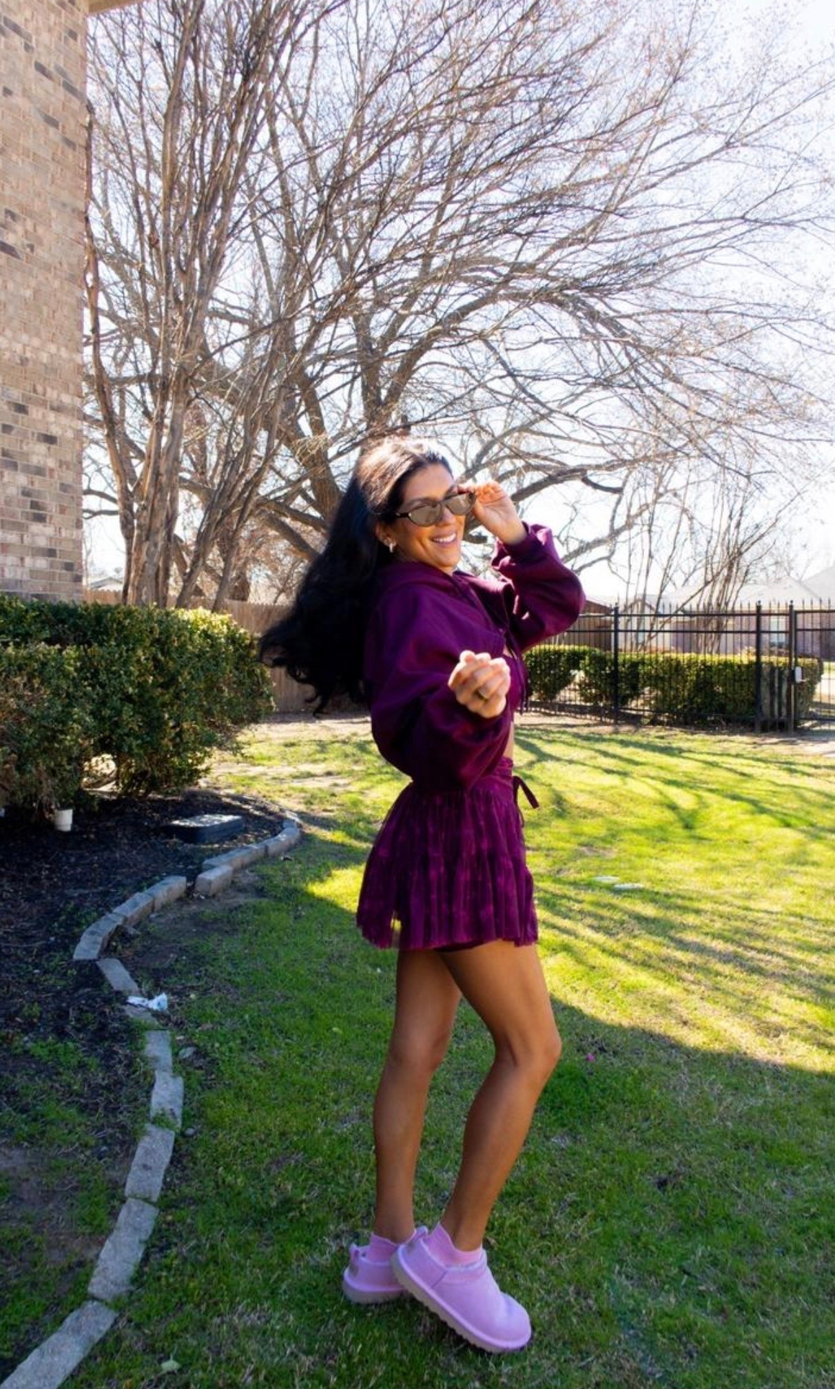 Sporty with a playful pop of color 💜 A cozy hoodie, pleated mini skirt, and pink slip-ons make this the cutest mix of comfy and fun.