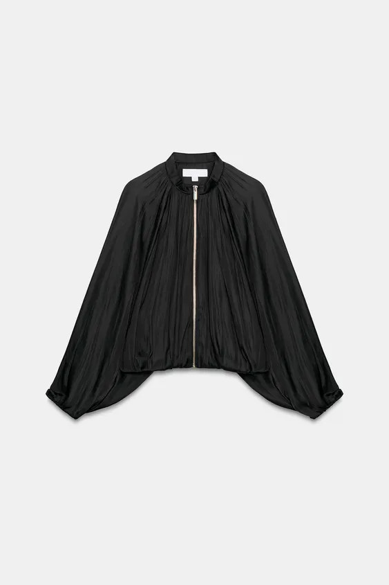 Flowy jacket with a round neck and long sleeves with elastic cuffs and dropped shoulders. Front p... | Zara US