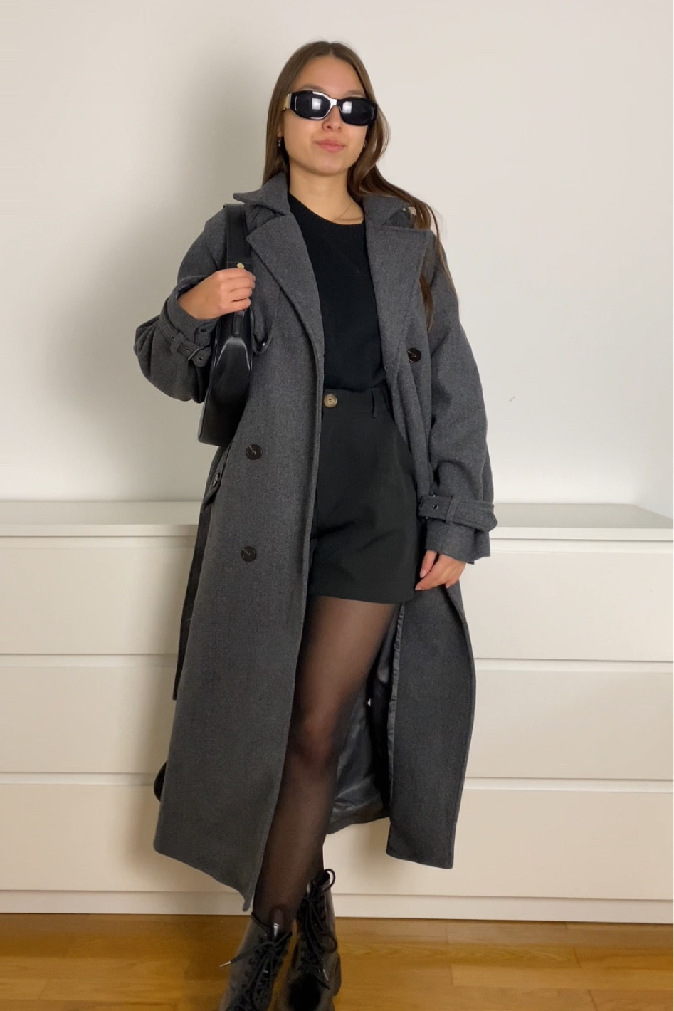 Winter layers, but make it chic 🖤✨ This grey coat is the perfect staple for staying cozy while keeping it stylish. Paired with classic black shorts, tights, and a sweater, it’s a timeless winter look that’s versatile for day or night. #WinterStyle #OOTD #LTKfashion

#LTKStyleTip #LTKBeauty #LTKSeasonal