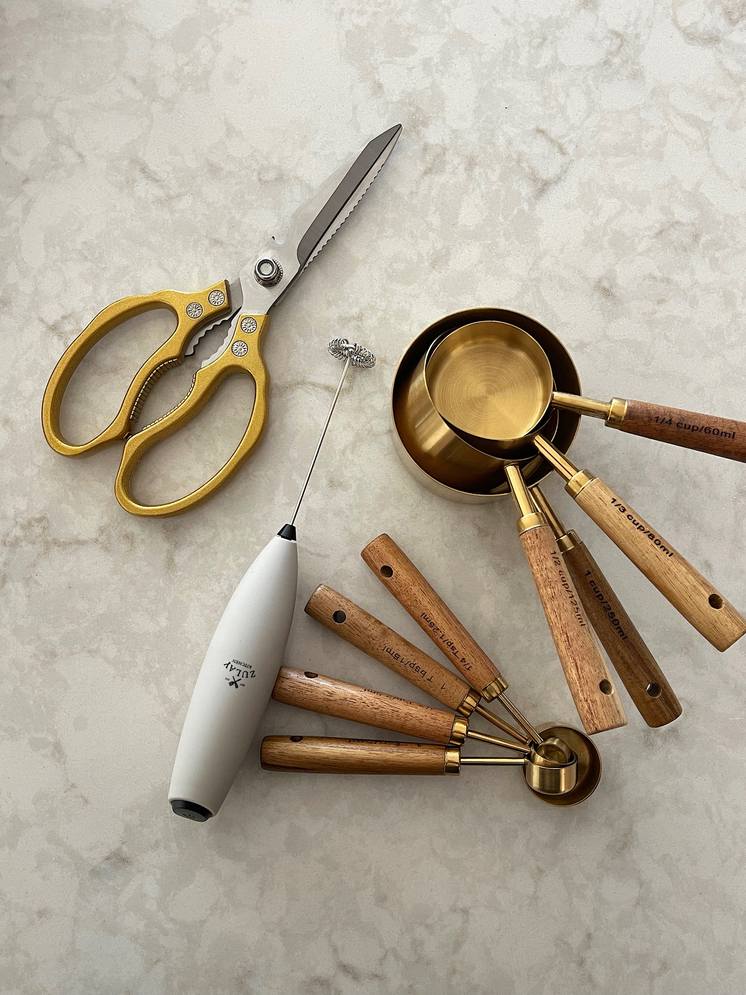 Amazon kitchen purchases! Gold scissors, measuring cups, coffee foam frother 



#LTKunder50 #LTKhome