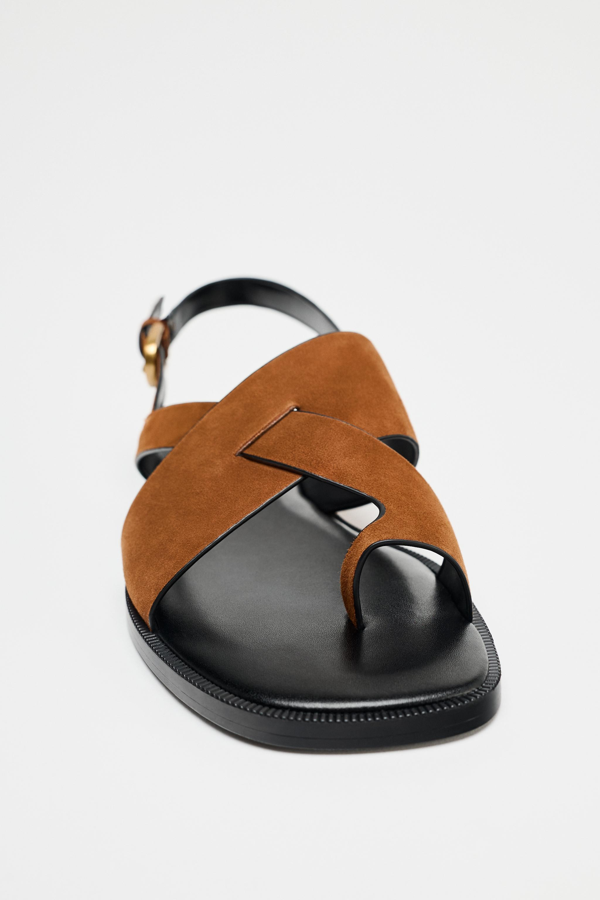 Suede slide sandals. Toe loop. Straps at front. Back strap with metal buckle at ankle. Squared to... | Zara US