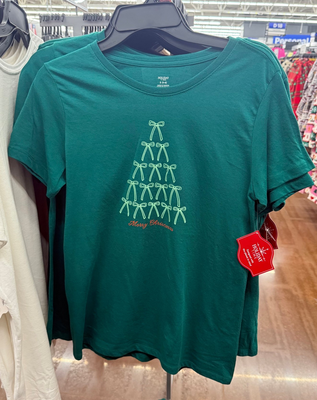 Green bow Christmas Graphic Tee (XXS–XXL) short sleeve

This Christmas graphic tee is perfect for casual holiday outfits, layering under cardigans, or Christmas morning comfort. Fun, festive, and great for last-minute holiday looks.

#LTKPlusSize #LTKMidsize #LTKHoliday