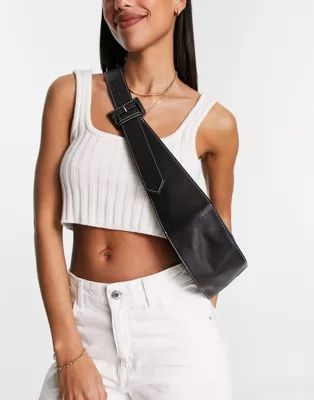 ASOS DESIGN leather curved base crossbody sling bag with contrast stitch in black | ASOS | ASOS (Global)