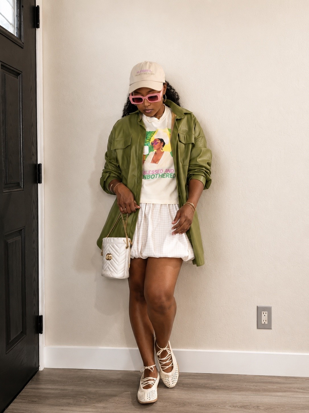 Neutral Outfits With Intentional Pops of Color Will Always Be One of My Favorite Ways to Style a Look 🤍💚

This outfit is mostly soft cream and neutral tones, but the olive green oversized shacket and pink sunglasses pull out the colors in the graphic tee and make the whole look feel styled without doing too much.

Styled With:
• Graphic Tee  
• Cream Bubble Skirt (Actually a Zara dress styled as a Skirt)  
• Olive Green Shacket  
• Woven Ballet Flats  
• Cream Handbag  
• Soft Neutral Accessories  

The woven Adidas ballet sneakers flats add the perfect feminine sporty touch while still keeping the outfit comfortable and effortless for everyday wear.

A casual chic outfit formula that feels elevated, playful, and easy to recreate.

Some pieces are from Zara and independent brands, so I linked similar styles for everything that isn’t available on LTK ✨

#EverydayStyle #NeutralStyle #CasualChic #BalletFlats #EffortlessStyle #SpringStyle #LTKStyle
