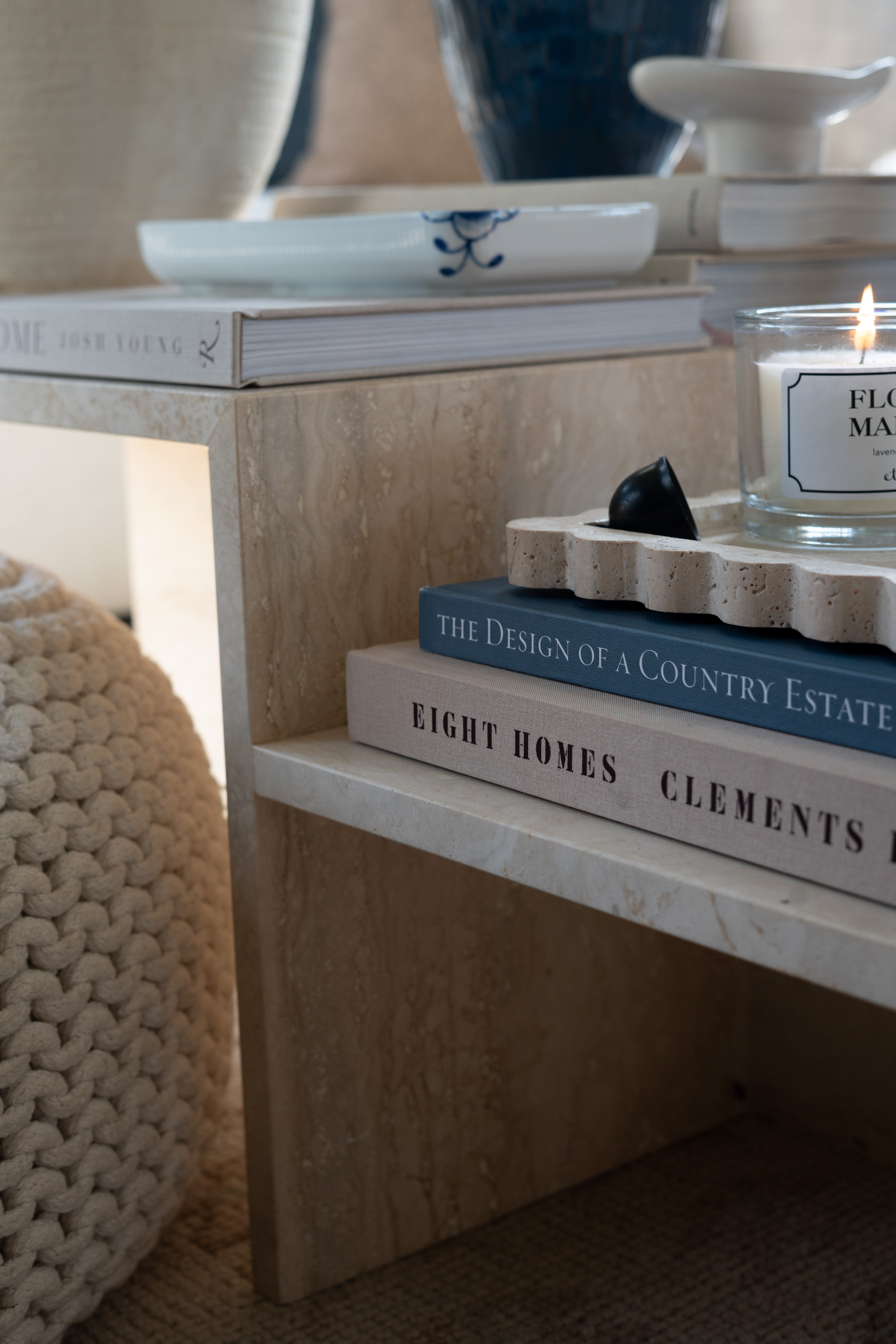 I swear it’s the small styling details that make a room feel so special. The marble table, stacked design books, soft knit textures, and candlelight create the most perfect cozy living room vibe. This is my favorite kind of calm home styling.  

 #LTKSeasonal #LTKHome #LTKSaleAlert