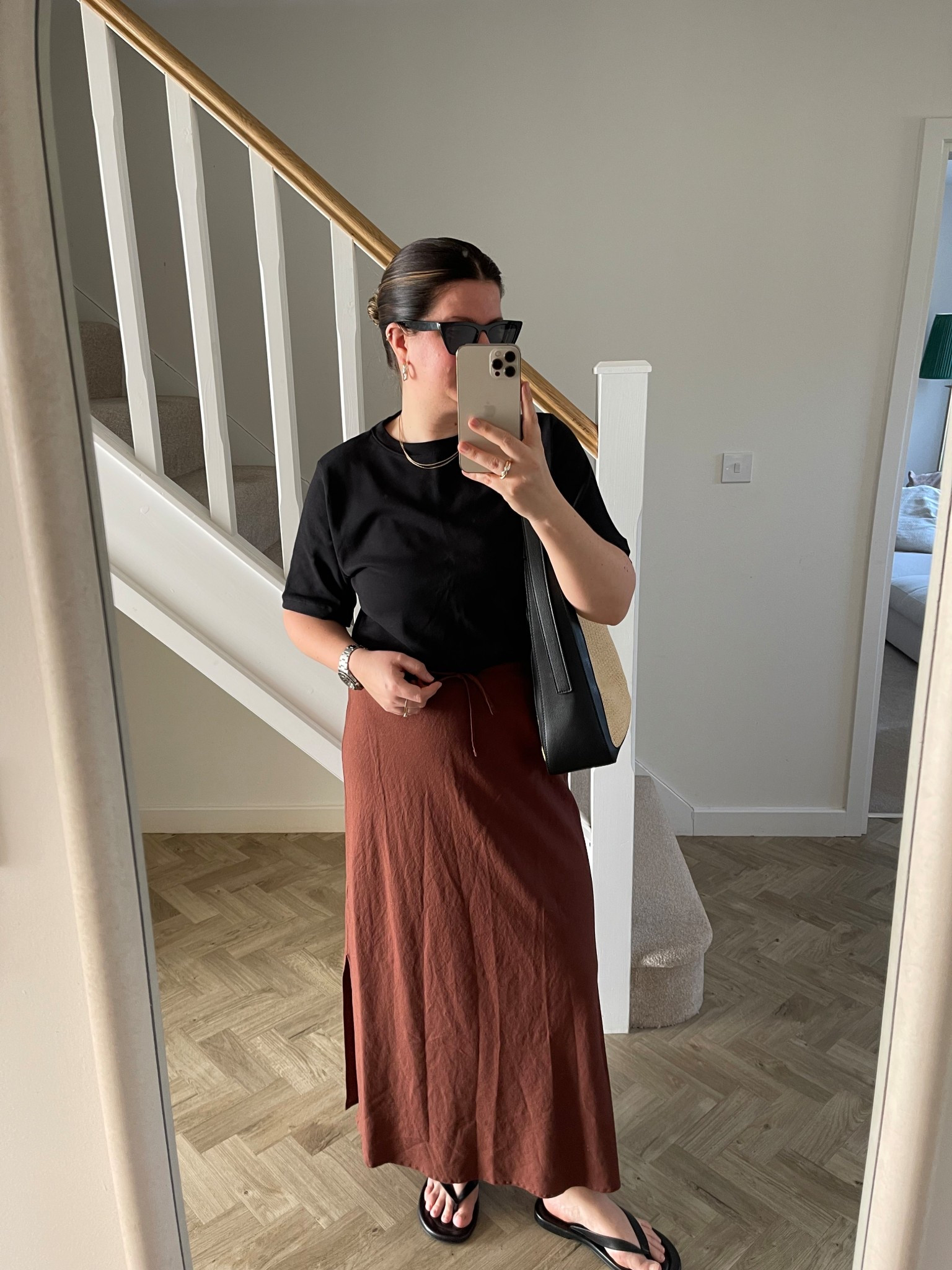 The linen chocolate spring skirt I posted on Instagram and TikTok. It has a lovely straight yet floaty silhouette, is linen and has a tie waist detail. This will be perfect this spring/summer switching between office and beachy. Plus, brown is still my colour of choice! Put it with a simple black tee, raffia bag and black leather flip flops for polish. 

#LTKeurope #LTKspring #LTKuk