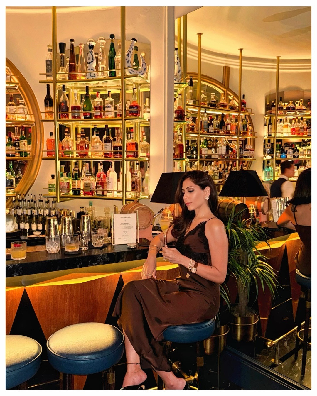Cocktail hour calls for silk. 🍸✨ Found the absolute perfect chocolate brown slip dress from Revolve for those late-night rendezvous. The delicate black lace detailing adds the most stunning, sultry edge to a classic silhouette. Perfect for date night or drinks at the bar. 

 #LTKvlog #LTKSeasonal #LTKTravel