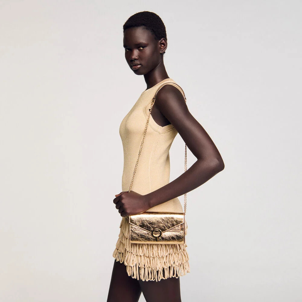 Gold leather clutch bag | Sandro US | Sandro-Paris US
