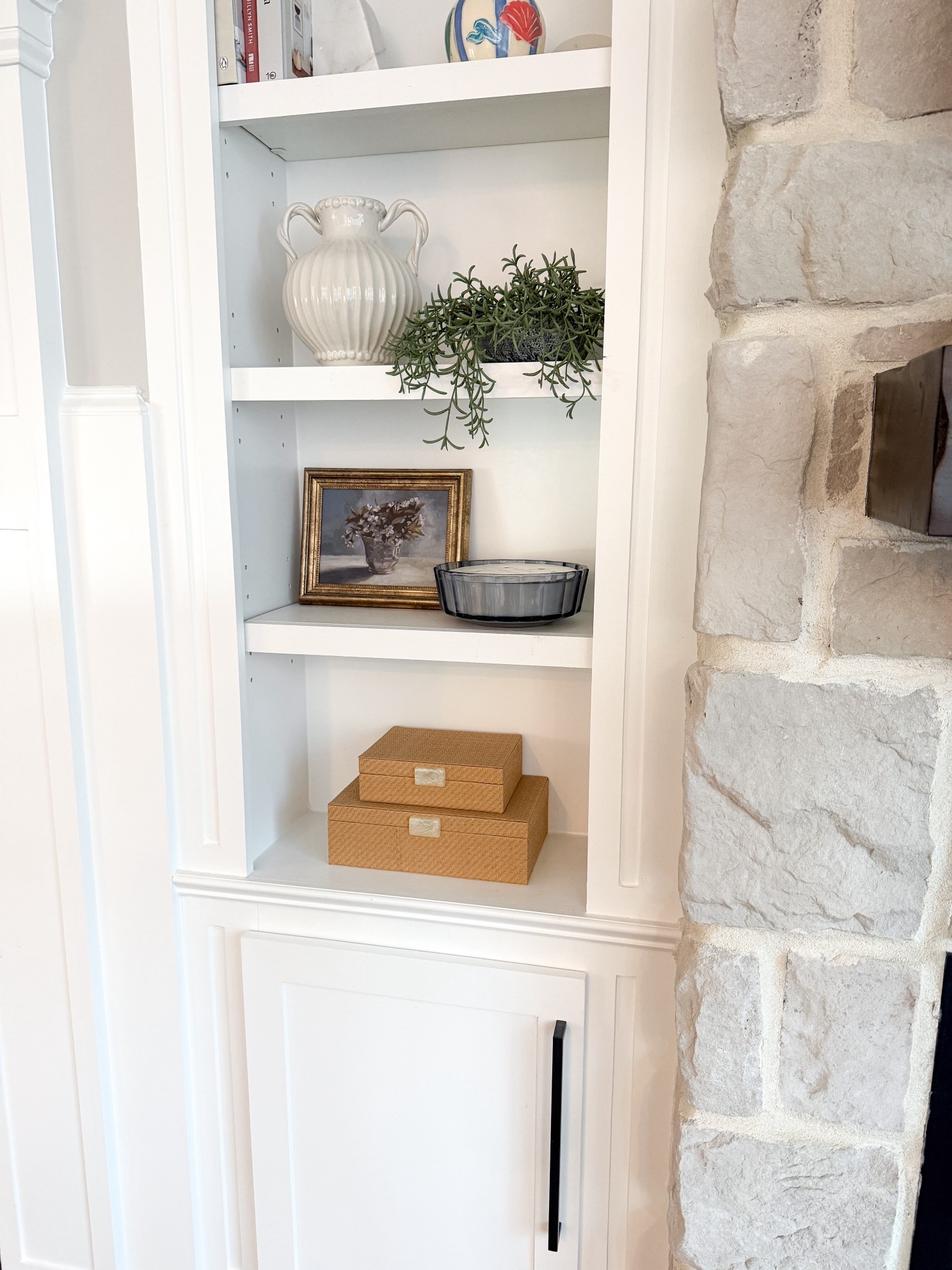 Redecorated these shelves after taking down all the Christmas decor. I’m loving this little corner! 

#LTKHome #LTKSeasonal