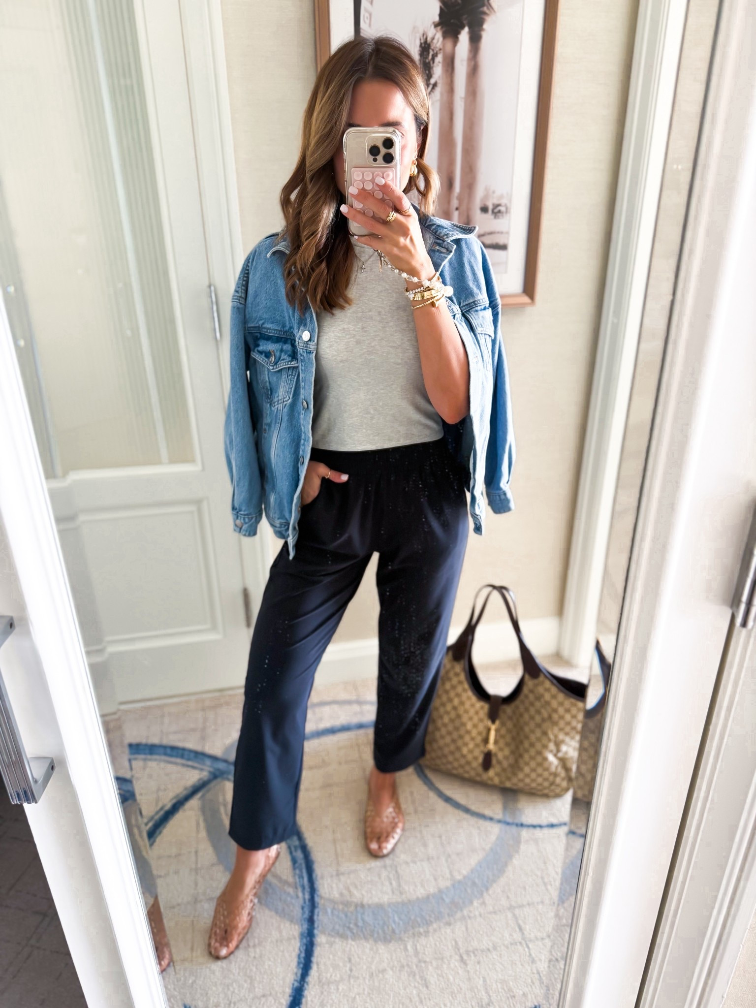 New from Amazon! My travel outfit of the day. I love these drapey ankle pants! Wearing XS. Travel outfits. Everyday outfits. Baby tee in XS. Elevated casual. Business casual. Wrinkle resistant and so comfortable! XXS petite in denim jacket. Jelly flats are whole sizes only - I’m a 6.5 and did a 6. 

#LTKootd #LTKPetite #LTKTravel