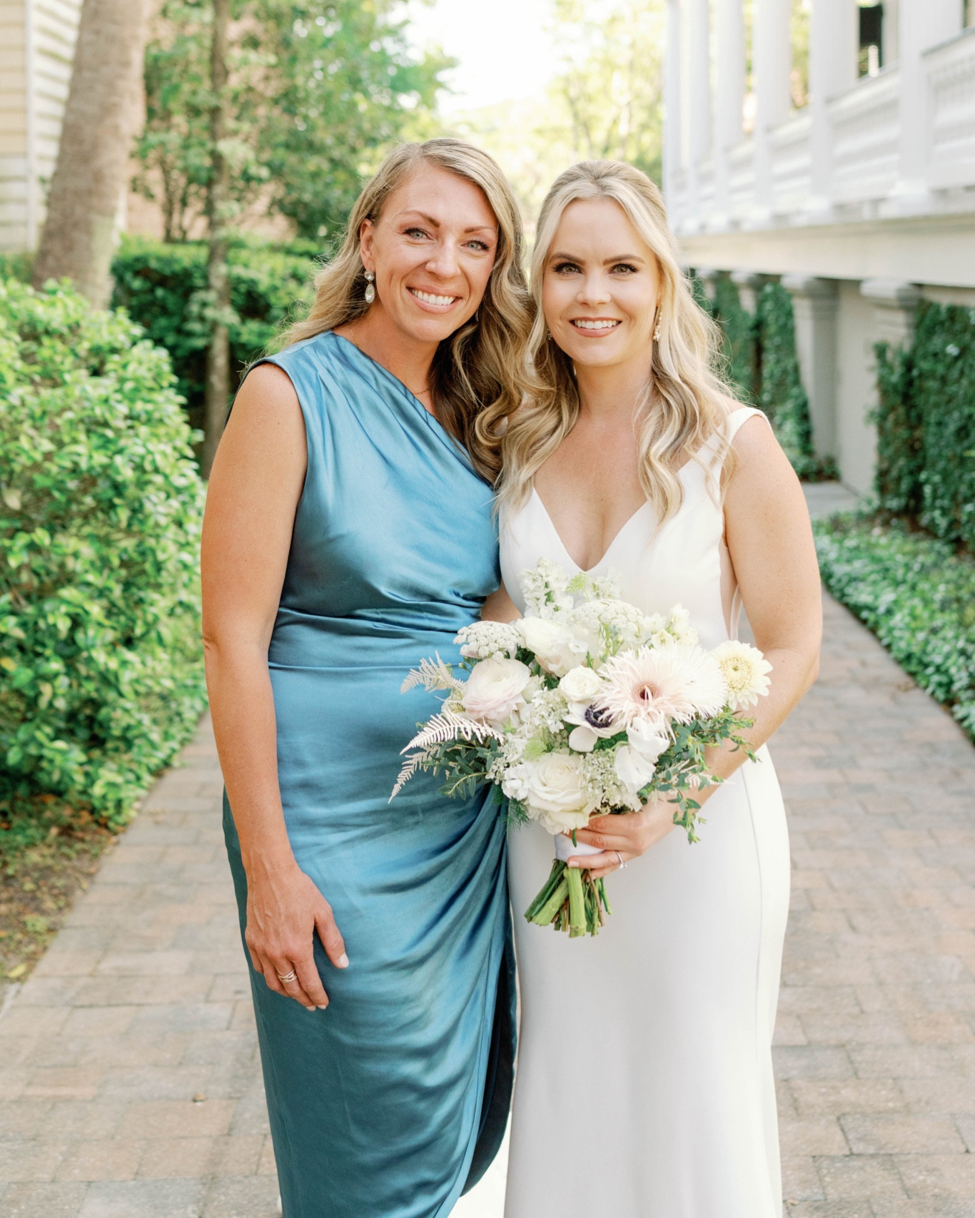 My beautiful sister-in-law and I on her wedding day! I loved this blue dress 💙💙

#LTKwedding #LTKGala #LTKparties