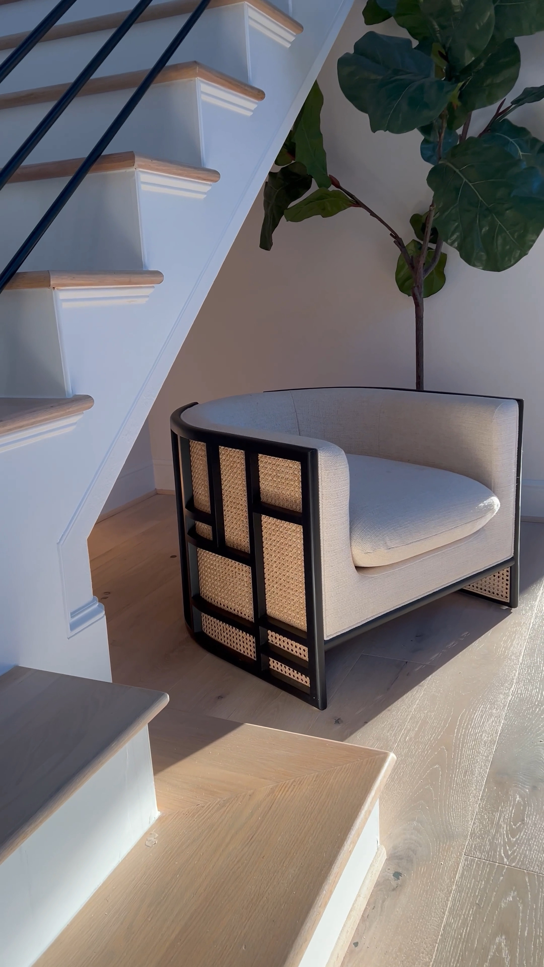 This chair is truly classic!… I 💯 believe this is one of the few rattan pieces that will stand again test of time/trends. ☺️🎉 

It comes in two color options and is the perfect piece if you love curved furniture. Let’s talk about the design for a second - I mean, just breathtaking! …. Even better in person 🥰 I love low & wide profile furniture pieces bc they make especially smaller spaces feel larger. This accent chair is a great addition to any space. 🖤🤍

 I’ve had these accent chairs for almost two years and the fabric/threads are incredibly durable and stain resistant and have only lightly cleaned them once! 🎉 

#LTKstyletip #LTKhome #LTKsalealert