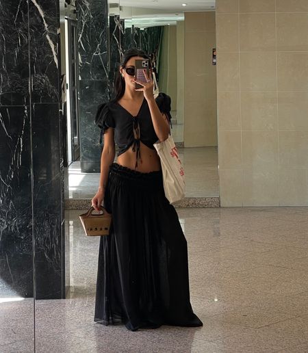 revolve LPA black skirt +
top set

#LTKeurope #LTKtravel #LTKfindsunder100