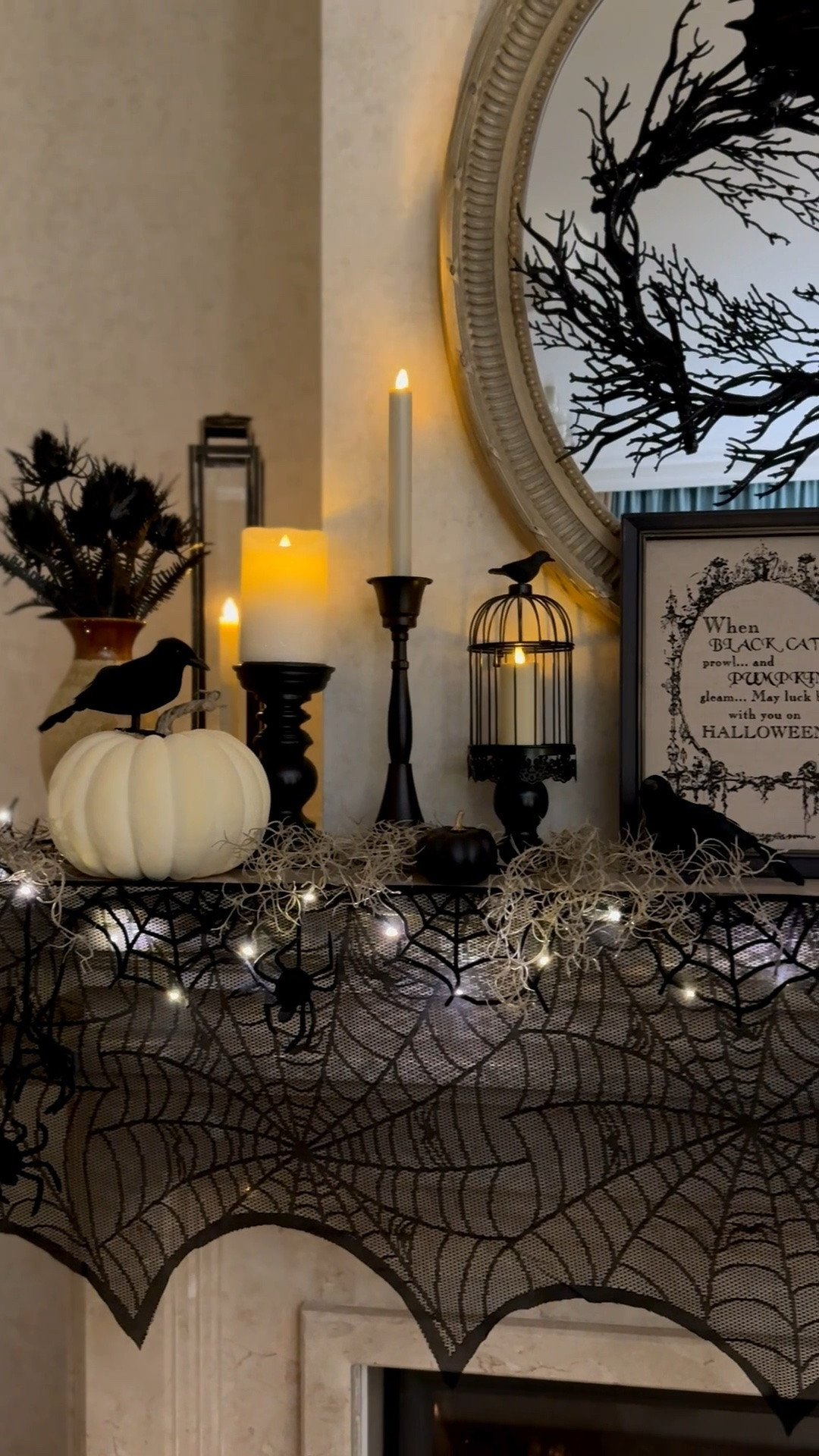Halloween living room mantel decor, spiderweb mantel runner, black candles, decorative crows, spooky chic decor

#LTKHome #LTKSaleAlert #LTKSeasonal