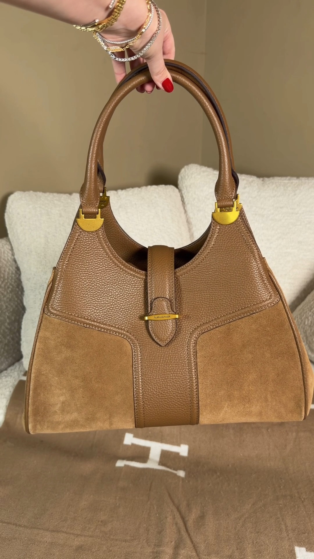 The bag brand I’ve had in my vision board for years 😍 Comment SHOP & I’ll dm you the link ♥️

I have had Fairfax & Favor products saved on my Pinterest board for years because I love their timeless style and I finally got one of their bags 😍

This is the new Aviemore shoulder bag. She is such a great everyday size and her double strap feature keeps everything inside super secure (even on my last chaotic road trip)!

She has pebbled leather combined with suede which gives such a unique fun vibe!  

She is about the same size as a medium Longchamp Le Pliage  tote or a Coach Rogue 31 all of which are my ideal bag sizes 😍

after spending time with her, I can definitely see why it fairfax and favor has such a loyal following. From the leather quality to the classic design, it’s one of those bags that feels timeless.
✨ Save this post if you’re always looking for underrated handbag brands. 🤎 Share it with a fellow bag lover.
