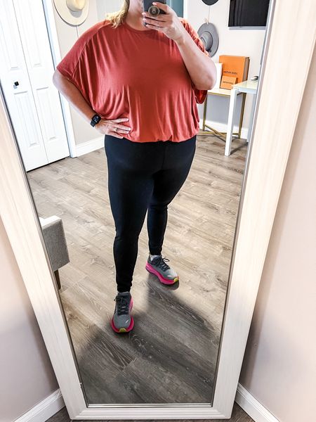 Plus size leggings and oversized tee outfit for a casual spring outfit. A great outfit for a spring walk outside or running errands. 

#LTKshoecrush #LTKActive #LTKover40