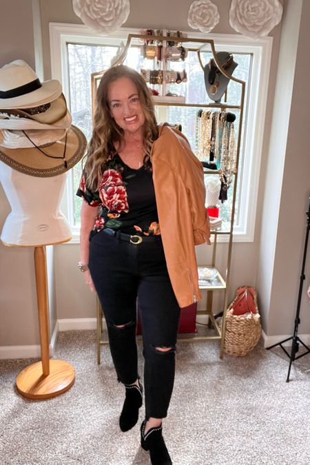 The perfect floral tee.. I love the longer slouchy sleeve and v neck style. I love it with black denim and my Carmel moto jacket.  Perfect to transition into Spring.

#LTKcurves #LTKFestival #LTKSeasonal