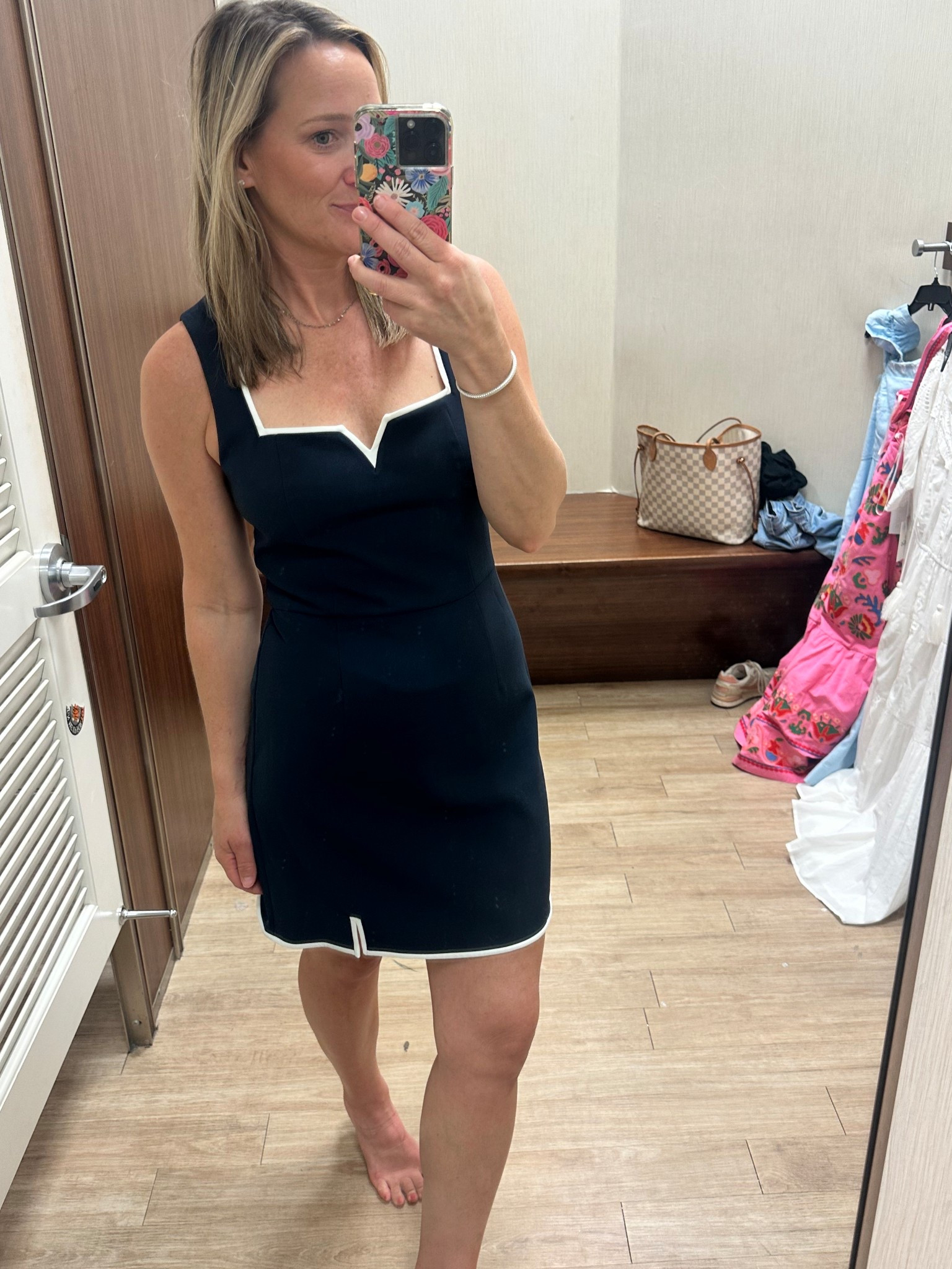 Navy Blue dress that is so flattering with gorgeous neckline. 

#LTKSaleAlert #LTKFindsUnder100