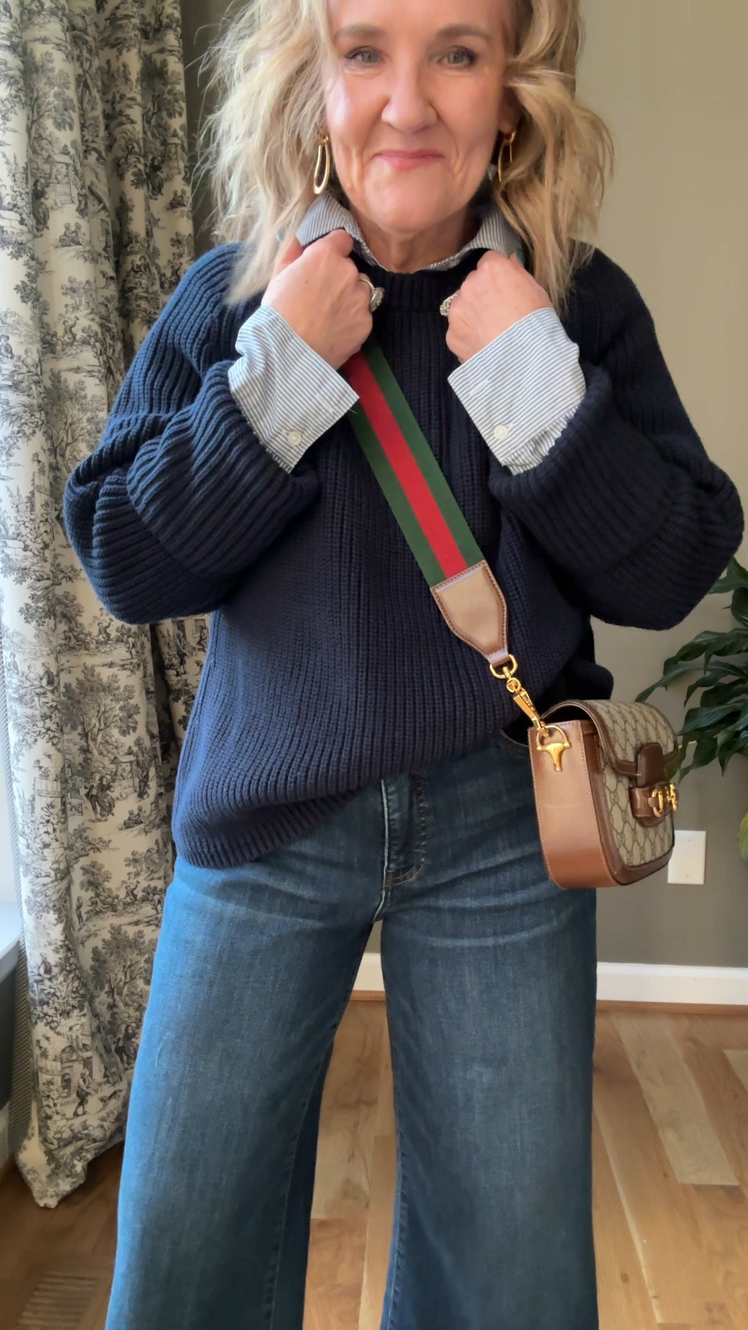 Todays OOTD 
Quince cotton sweater I am wearing a size XL. You can see it’s oversized, I would say it is true to size if I were to buy a size medium. 
My shirt is oversized. I’m wearing a large, I can’t believe it’s still in stock. It’s a great basic. 
These jeans, I found several sources to link at varying prices. They’re the same jeans but linking a couple places so that you can find your size. 

I’m 5 foot three and I cut about 2 inches off the bottom to make them ankle length on me 

The birdies velvet flats are very very comfortable. I was inspired by a photo on Pinterest and she was wearing loafers. I am going to go on the hunt for a comfortable pair of loafers, but I’ll be honest. I’m not sure if they exist. 

A pretty pair of Julie voss wave earrings in gold is the only jewelry I’m wearing

Winter outfit Pinterest inspired navy sweater Meg jeans kut from the kloth jeans 

#LTKFindsUnder100 #LTKOver40 #LTKStyleTip