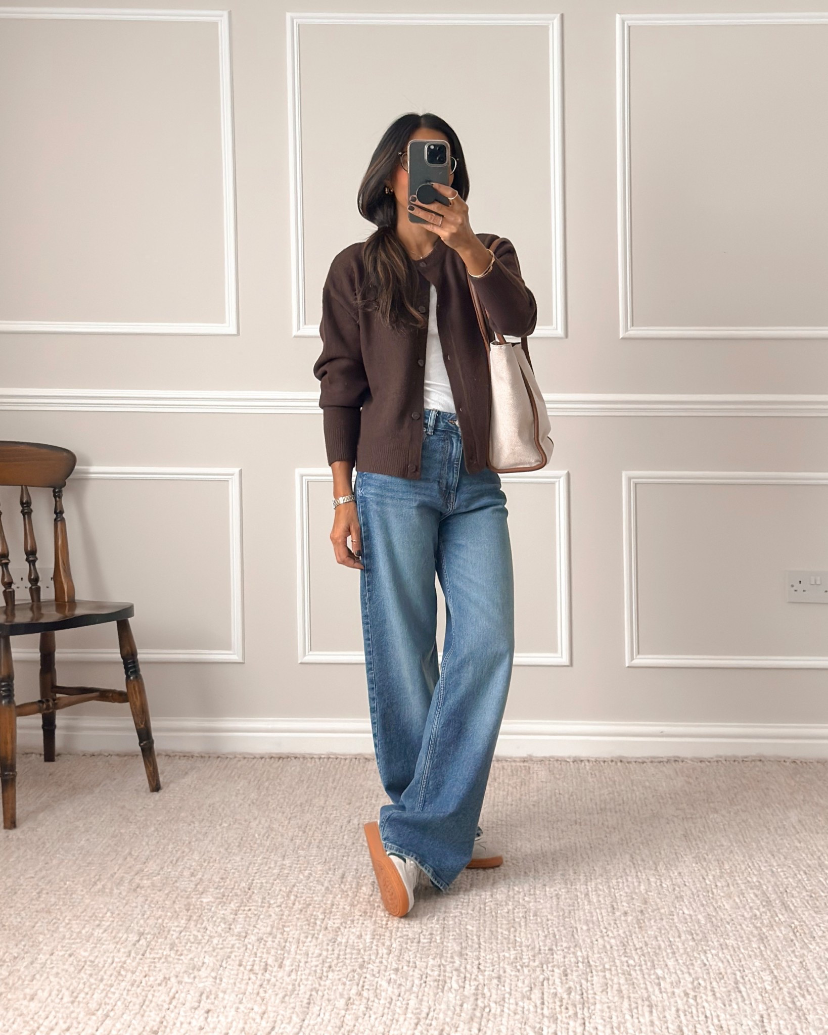 Cardigan

Wearing size small but if you want an oversized feel you may want to size up. 

Wide leg jeans - Shade ‘denim blue'
I’ve got these in 4 different colours because I love them. I’ve sized up in these as they’re quite snug - remember to always buy based on comfort and never what the label reads. You will need to go to the last 2 pictures on the H&M website. The edit of these jeans on the pictures before that is really bad and doesn’t show the truest colour.

Also, I’m 5’5 and they’re just a little long on me but will use wonderweb or pins to just take them up at the back so they don’t drag along the floor.

Trainers - Adidas Spezial
