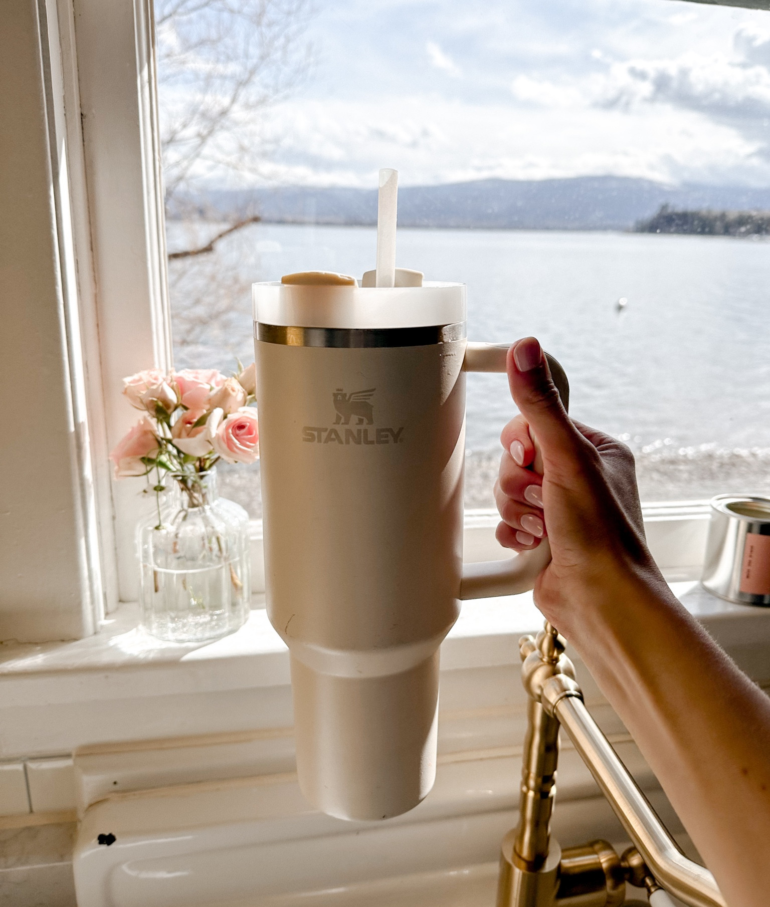 My @stanley_brand 40 oz Quencher is the MVP of my travel days and just motherhood in general! I love how they’re both cute and practical!! #StanleyPartner