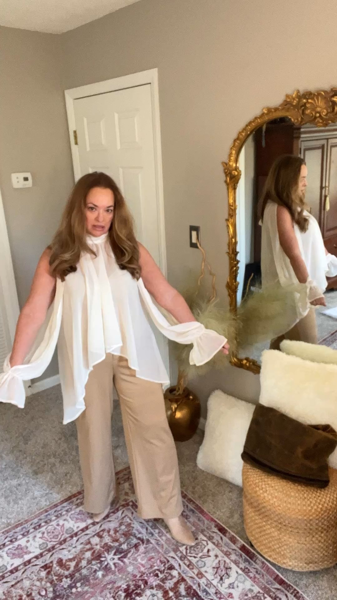 Show Stopper Statement blouse! Sheer chiffon high neck and open sleeves with a long train hem in the back! Available in black, brown and plum.?

#LTKNYFW #LTKootd #LTKgrwm