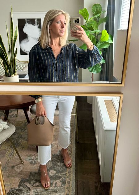 Office to dinner outfit. Linked the same jeans - but with regular hem (frayed are sold out). Top is past season Zara. 

White jeans
Denim
Navy top
Blouse
Gold hoops
Hoop earrings 
Gold jewelry
Mini bag
Cork Sandals vinyl mules
Clear shoes nude
Saks partner / team

#LTKWorkwear #LTKStyleTip #LTKFindsUnder100