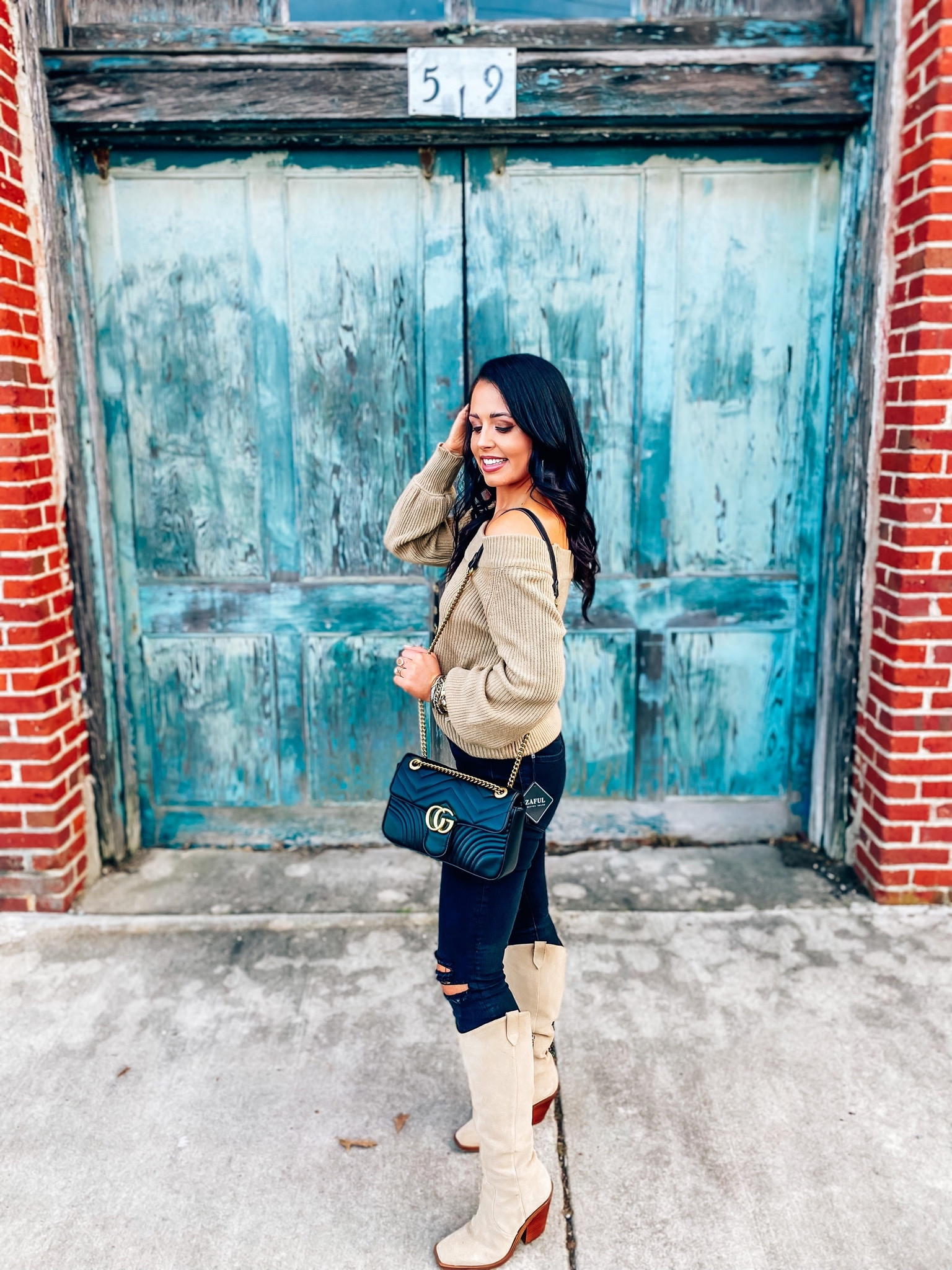 Under $25 amazon off the shoulder one size tan sweater, black distressed jeans and tan western boots #founditonamazon 

#LTKshoecrush #LTKSale #LTKunder50