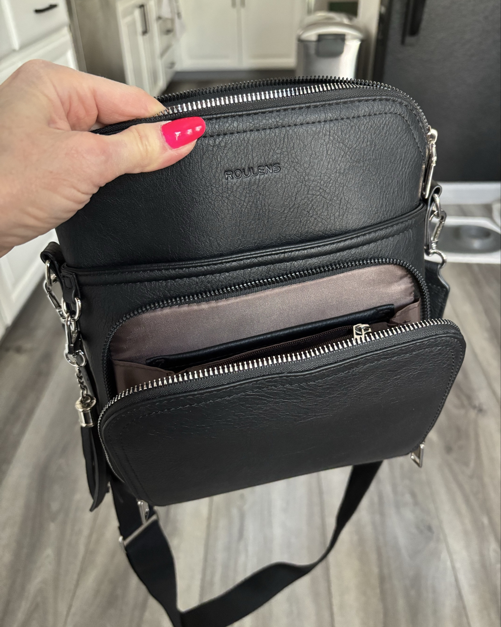 Perfect size travel purse! I loved all the compartments and built in card/wallet section. 