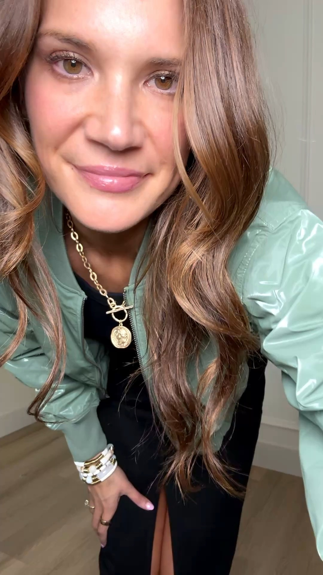 Obsessed with this little green jacket for spring. The glossy finish makes it feel so elevated and trendy, and it’s the perfect lightweight layer to throw on over basics. I love it paired with this black midi skirt and sneakers for a sporty chic everyday outfit.

Green bomber jacket, spring jacket outfit, sporty chic style, casual everyday outfit, black midi skirt outfit, trendy layering piece, lightweight spring jacket, elevated casual look, street style outfit, cool girl outfit, casual sneakers outfit, spring fashion finds, everyday mom style, effortless outfit idea, Stang and

#LTKootd #LTKSeasonal #LTKTall