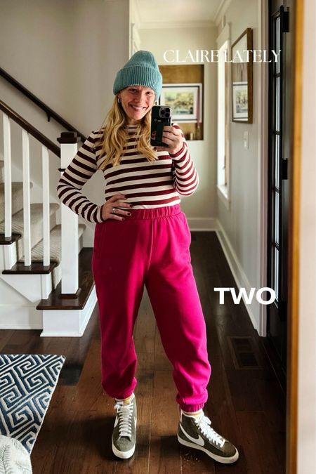 Sweatpants and sneakers, 3 ways. - high top sneakers with stripe socks paired with a playful stripe long sleeve elevate the casual sweatpants. A beanie hat adds an unexpected color. Amazon earrings and layered necklaces finish the outfit. 
❤️ Claire Lately 

#LTKover40 #LTKMostLoved #LTKtravel