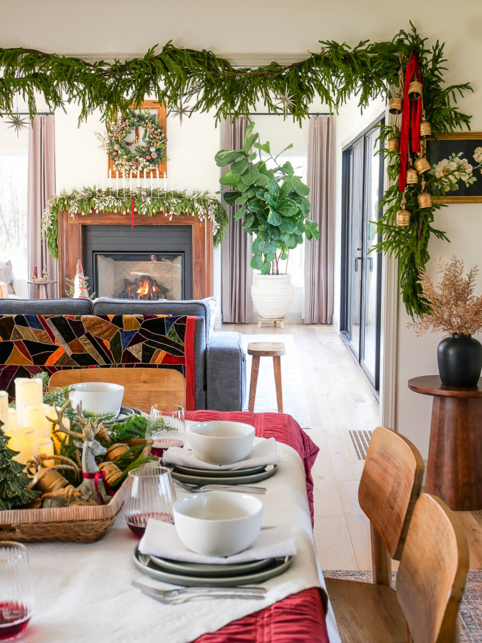 This Christmas tablescape was so easy to put together with every day dishes and a velvet quilt. I love how it sets off the mantle and garland the dining room from the living room. 

#LTKHome #LTKHoliday #LTKSeasonal