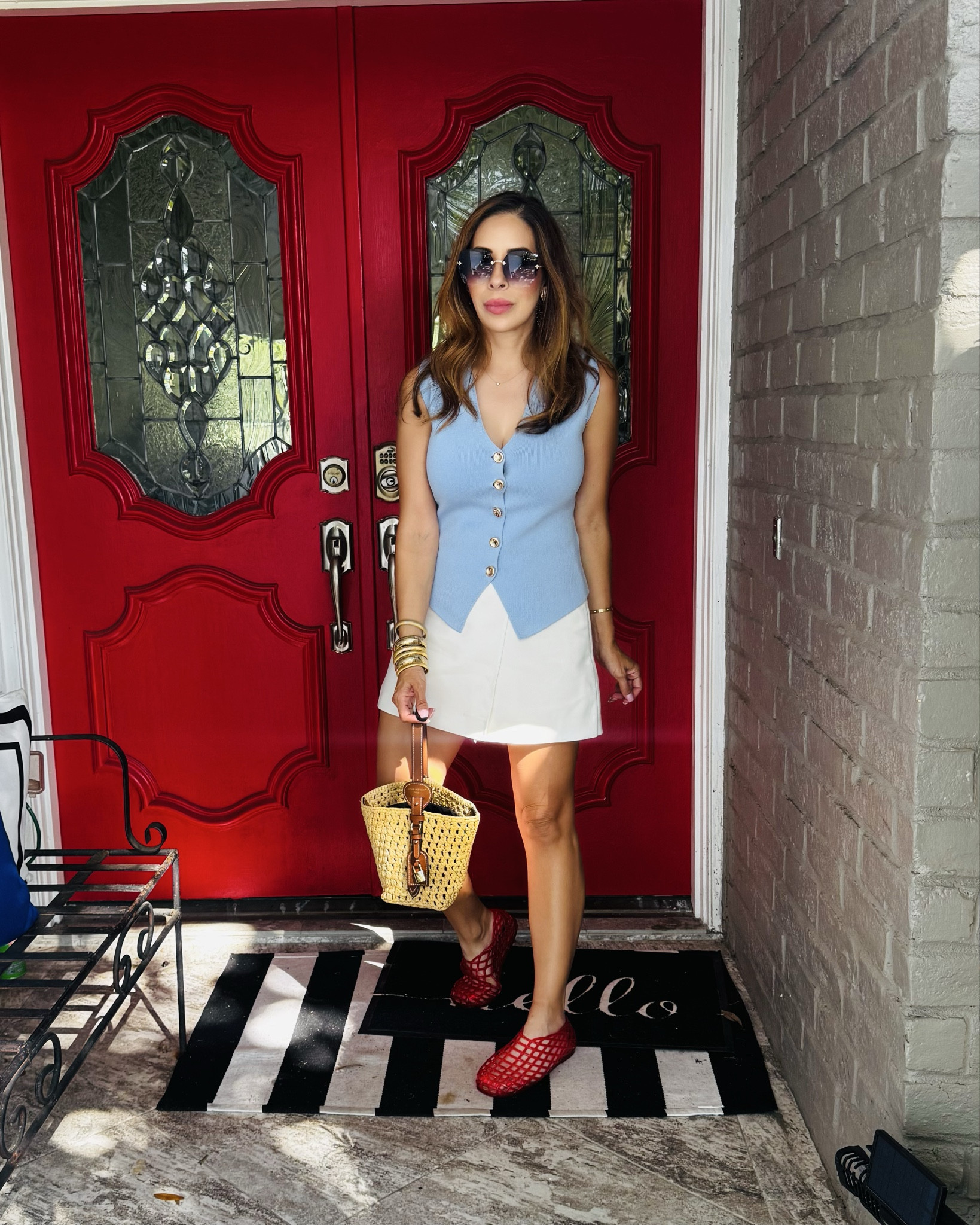 Soaking up the last of August.
We made it 2 weeks into school y’all. 
Sore throats and fevers for all. 
This is going to be the longest fastest year ever! 

Vests are raging this fall. I’m loving this soft blue, it will pair so well with brown shades and suede later next month. For now it gets a bright white skort, red flats and a raffia handbag. 

Red is my favorite ❤️ so I love adding in pops of red to my outfits. And there’s always my door ❤️ 



#LTKStyleTip #LTKSeasonal #LTKOver40