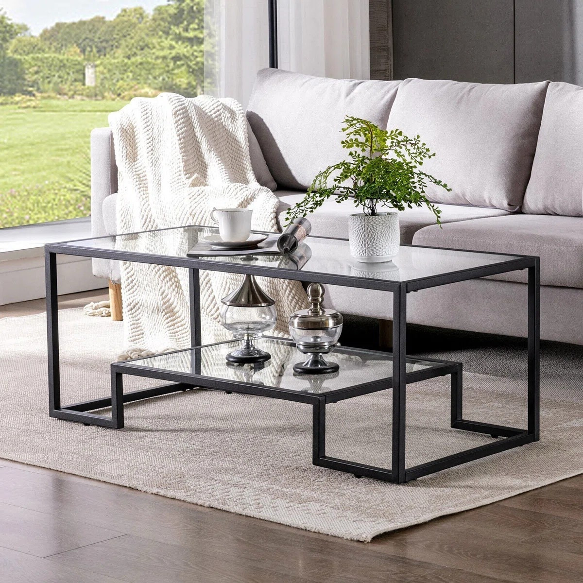 Style your new home or apartment with a classic rectangular glass coffee table. The Rectangular Tempered Glass Coffee Table With Metal Frame,accent Modern Side Table With Additional Storage Shelf is ON SALE and under $100.

Keywords: Modern coffee table, glass coffee table, round coffee table, round glass coffee table, faux marble coffee table, stone coffee table, rectangular coffee table, rectangular glass coffee table, luxury coffee table, gold coffee table, nesting coffee table, living room

#LTKSeasonal #LTKSaleAlert #LTKHome