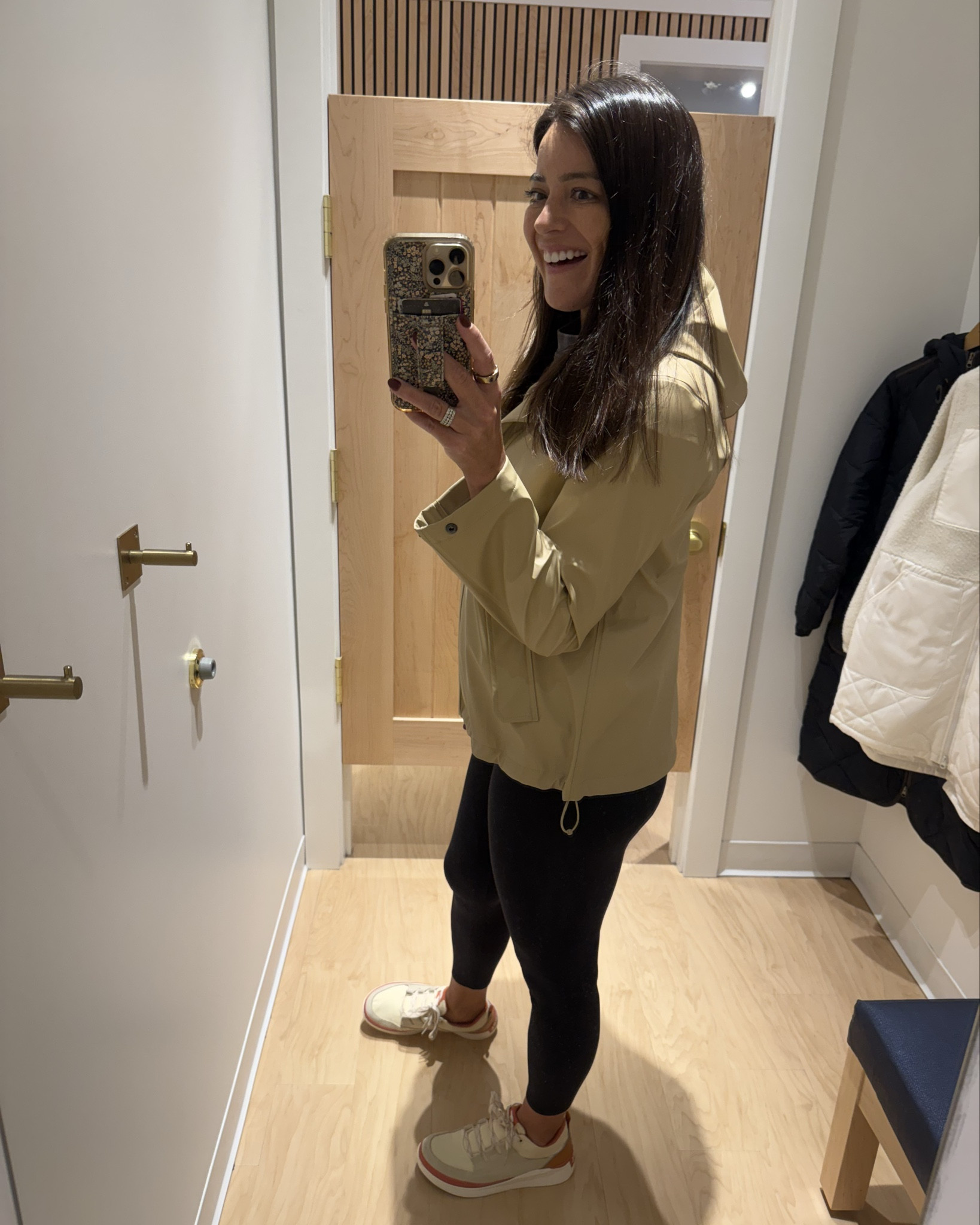 I came back to purchase this one! I love the feel of it - definitely more of a utility rain coat. Feels super high end. I sized down to a small. 

#LTKSeasonal