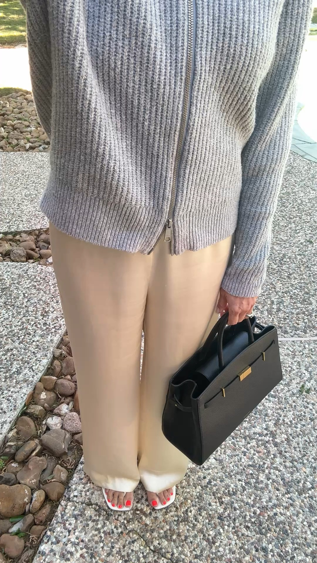 So soft sweater (on sale) and luxurious satin -a perfect spring match. 🤍 
Sweater also available in brown and I’m linking a different satin pant in brown too. 🎉



Spring outfits 2026 / 

#LTKSaleAlert #LTKTravel #LTKOver40