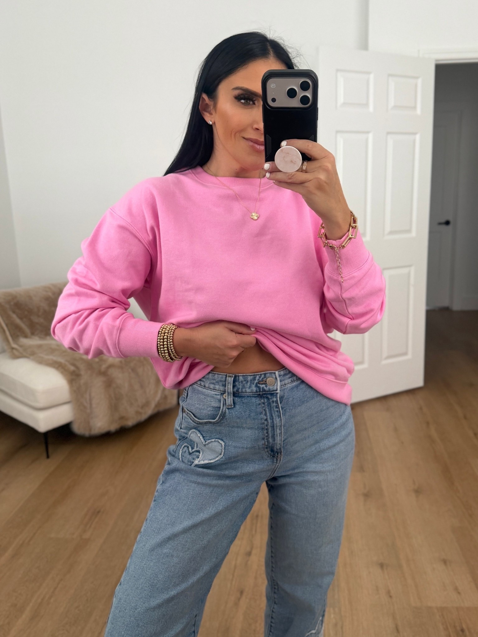 No Boundaries Fleece Oversized Sweatshirt with Long Sleeves wearing size medium. No Boundaries High Rise Baggy Wide Leg Jeans with Heart Patch wearing size small. 