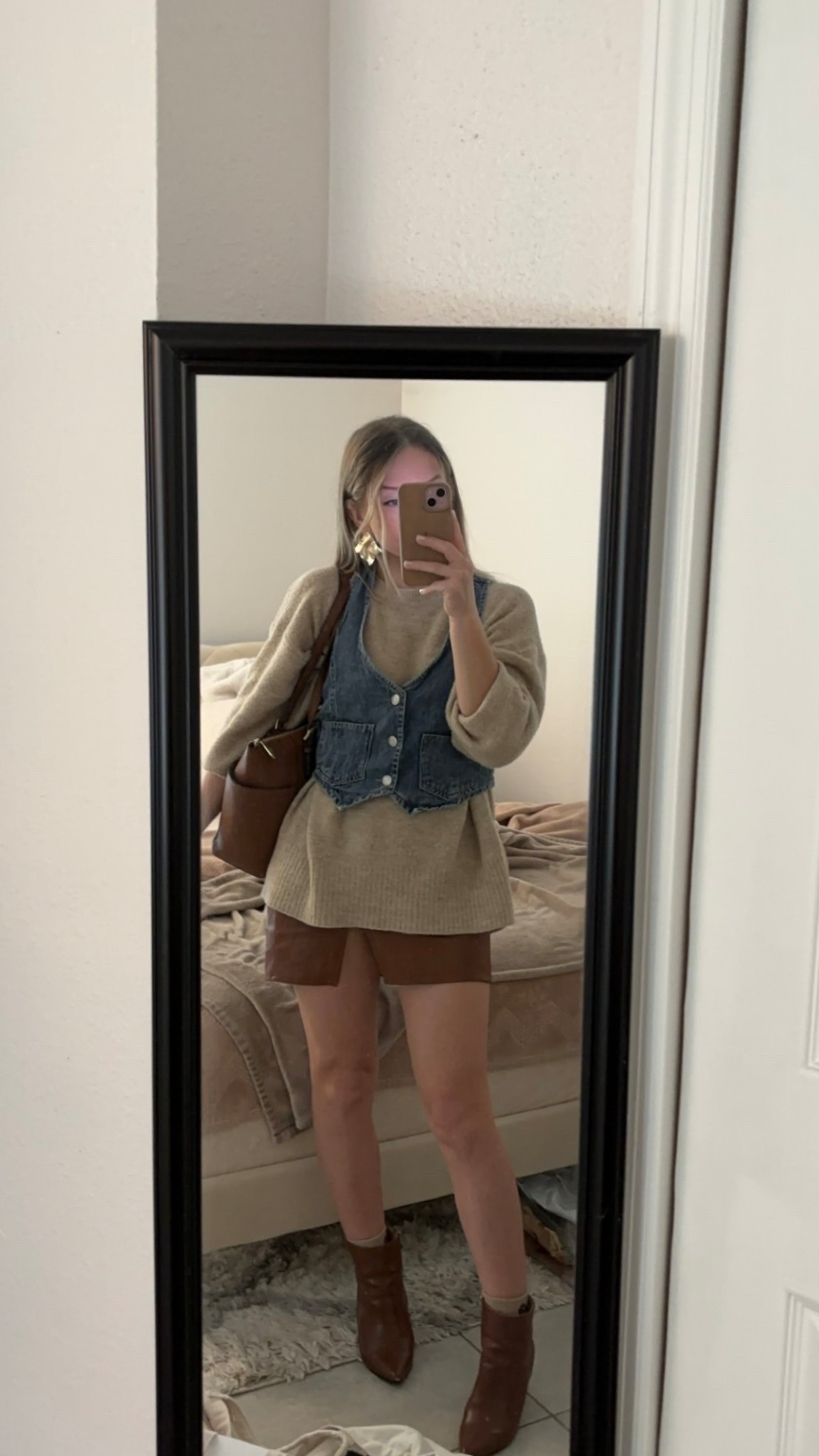 dressy-casual ootd🤎 wearing a denim vest x sweater x skirt outfit & linked exact earrings & bag, and similar of everything else!

#LTKSeasonal #LTKootd