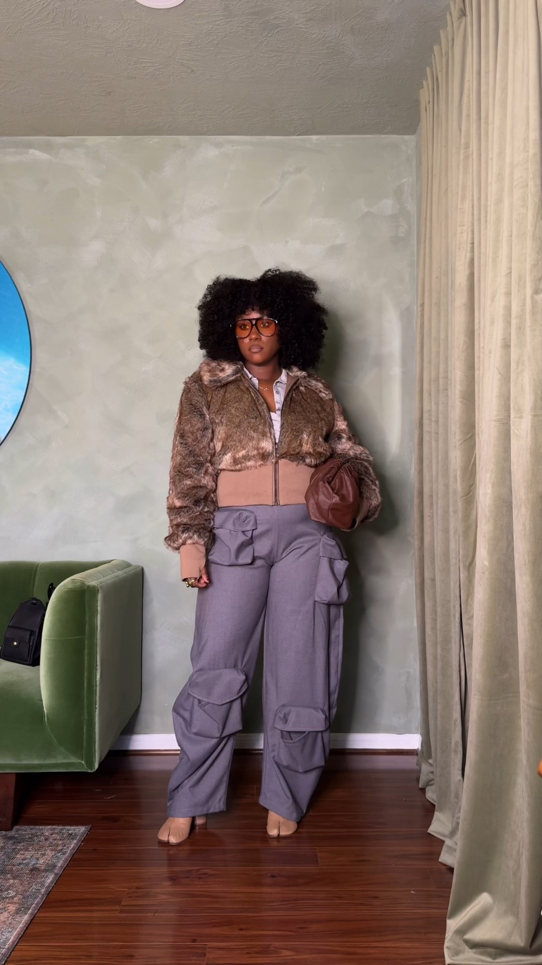 Grey cargo pants, fur jacket and tabis