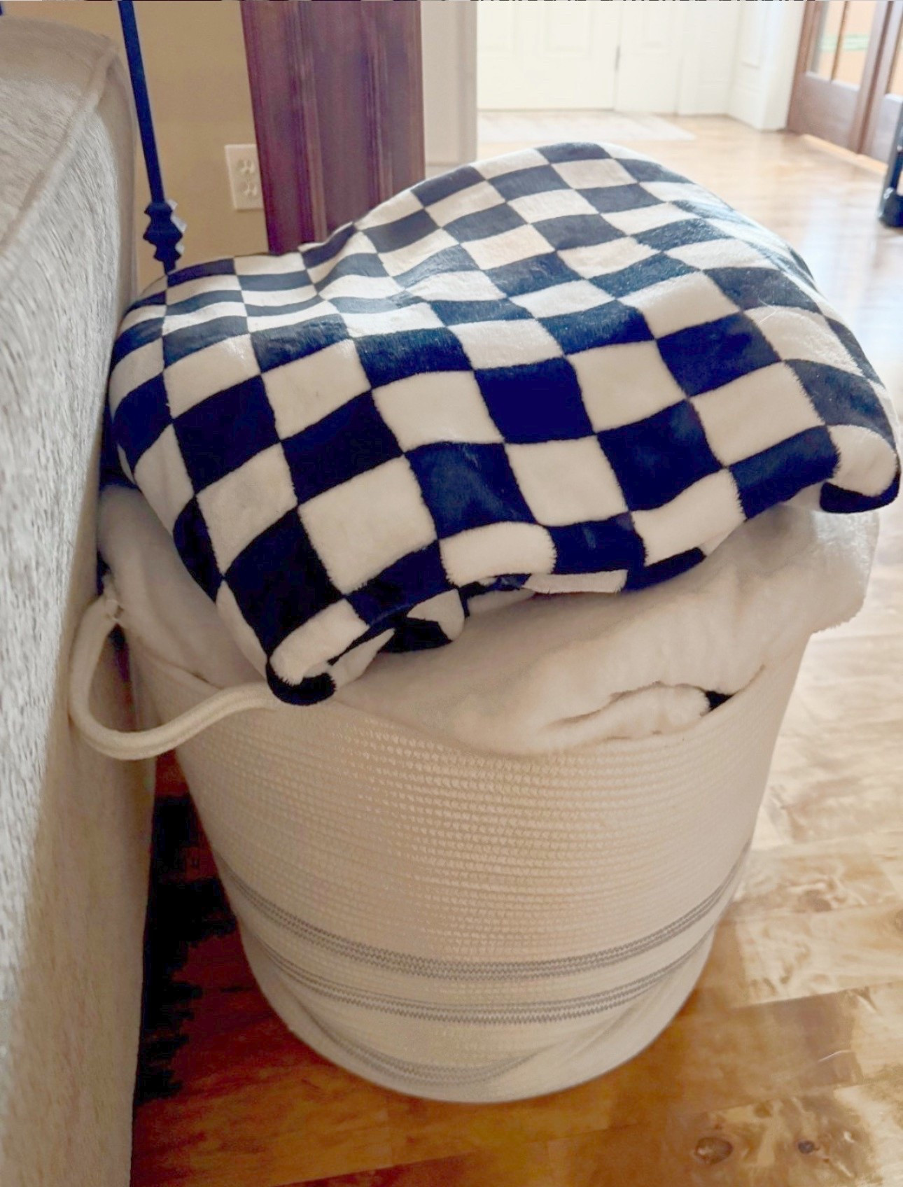 Cozy corner goals 🖤🤍 Checkerboard flannel throw tucked in a woven blanket basket 🧺

Previewing Black Friday faves, Cyber Monday classics — the Christmas gift you won’t regret. 🙌🏻

 #LTKHome

#LTKU

#LTKmomlife