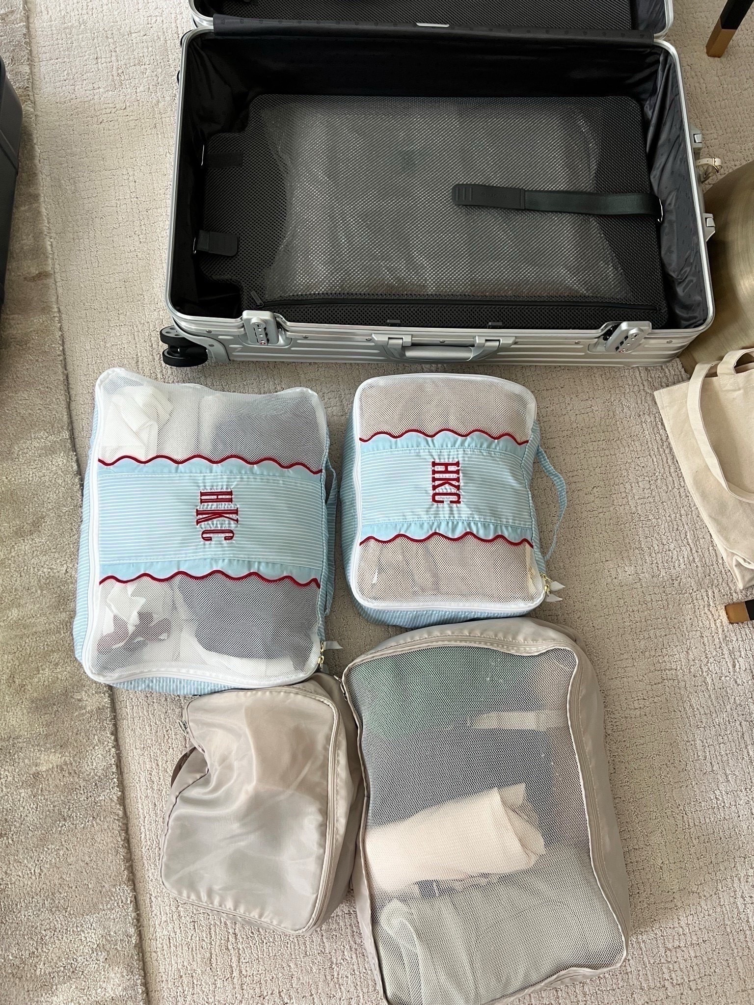 Love my packing cubes that are customizable! So pretty and the blue and red is perfect for summer travel. Easy to organize and maintain your clothing  Luggage is Rimowa but linking similar ones. 


#LTKTravel