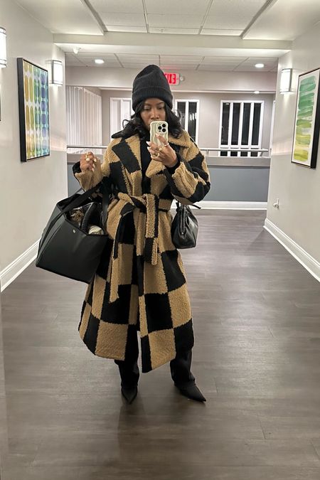 Loving this maxi coat for winter. It’s super warm and I love the checkered print. Comes with a belt. The long length is just perfect. Paired it with a beanie, turtle neck, high wait jeans and sock boots. 

#LTKSeasonal #LTKstyletip