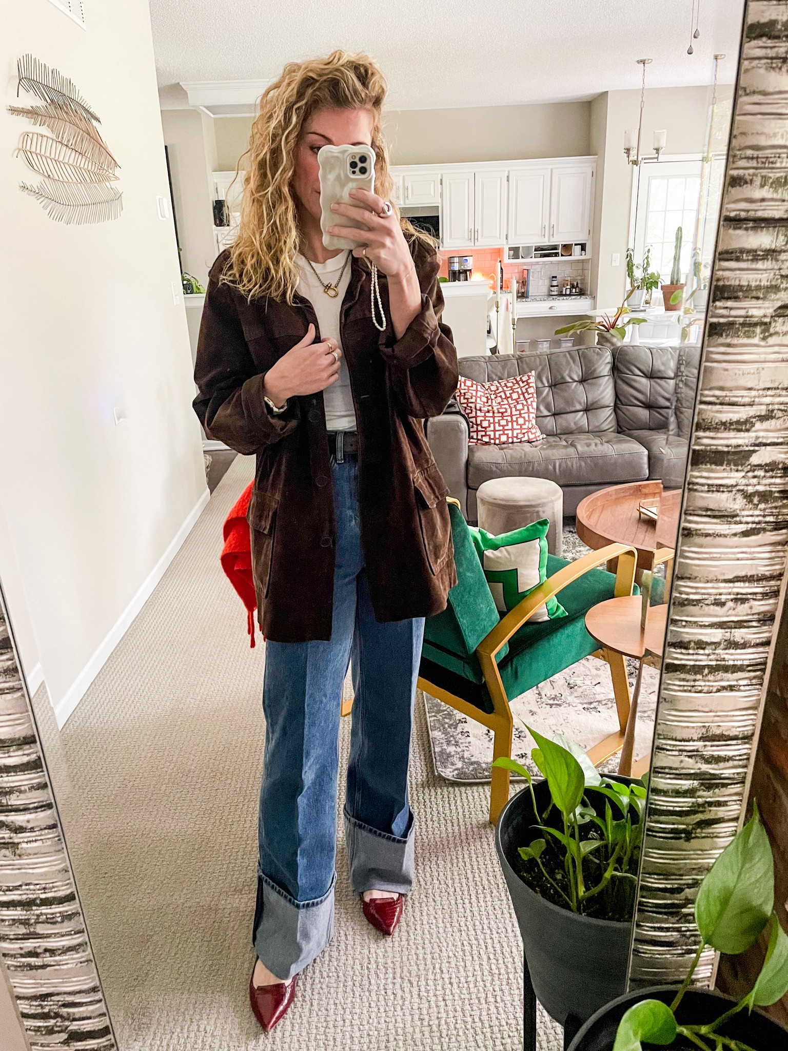 Brown suede jacket (vintage, but found some below) with wide-cuffed denim  

#LTKStyleTip #LTKFindsUnder100 #LTKSeasonal