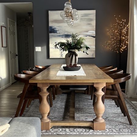 ~My Dining Room Links~
Table is from Restoration Hardware, but I’ve linked similar styles. Curtains, chairs light and washable rug are exact links. 

Boutique Rug Discount code: KELLIHOL will take 10% off (expires soon). Code KELLI will take 5% off after my other code expires. 

My prelit tree came in a set of 3. I’ve linked a singular similar option as well. 

Art is from Home Goods, I’ve linked a similar style. 

Curtains are the color: Sour cream.

Wall color is Peppercorn by SW (lightened 50%).

#diningroomchairs #diningtable 

#LTKSeasonal #LTKHoliday #LTKhome