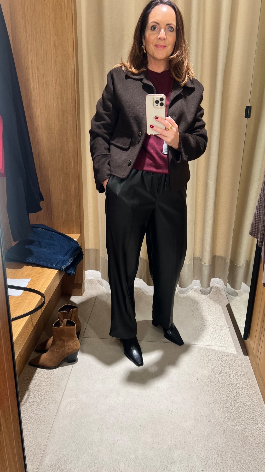 This outfit nails smart-casual style with a mix of textures and timeless tones. The cropped chocolate jacket adds structure (perfect for balancing proportions), layered over a rich berry knit for a pop of warmth. The faux leather wide-leg joggers bring modern ease — comfortable and flattering — finished with sleek pointed boots for a lengthened silhouette.

Style tip: Add gold hoops and a crossbody for daytime look, or swap to heels and a clutch for evening drinks.

#LTKover50style #LTKuk #LTKautumn