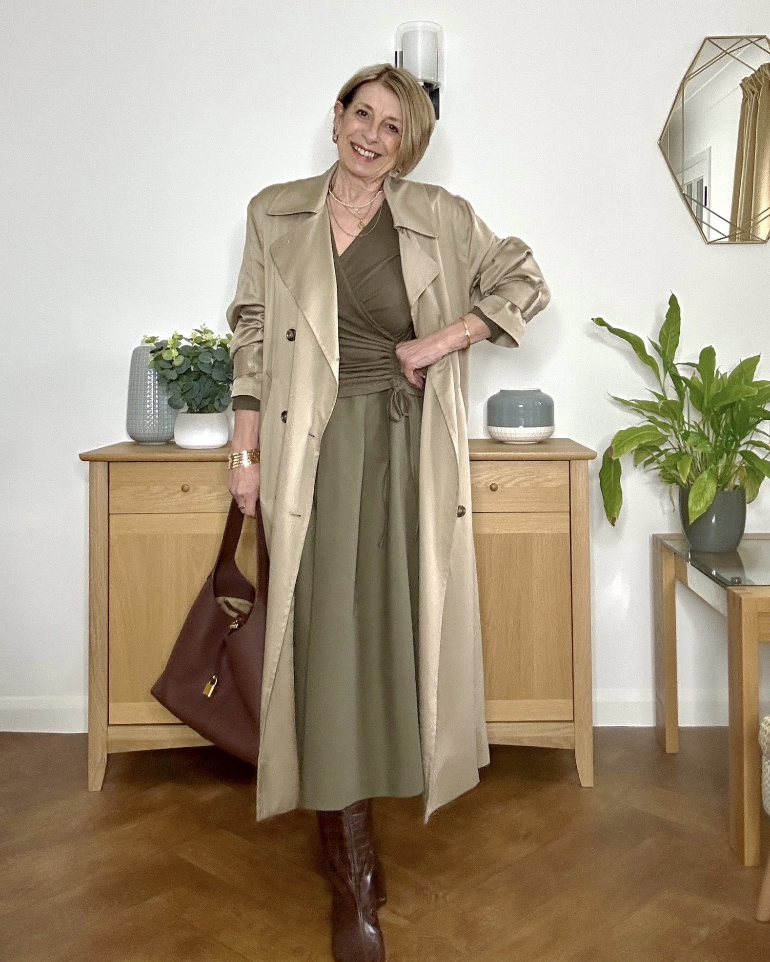 Chic everyday look. Flattering cosy ruched top with A-line midi skirt. A forever trench & chocolate brown boots for warmth. 


#LTKover50style #LTKspring